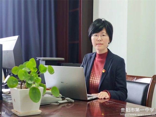 谭美金校长.jpg